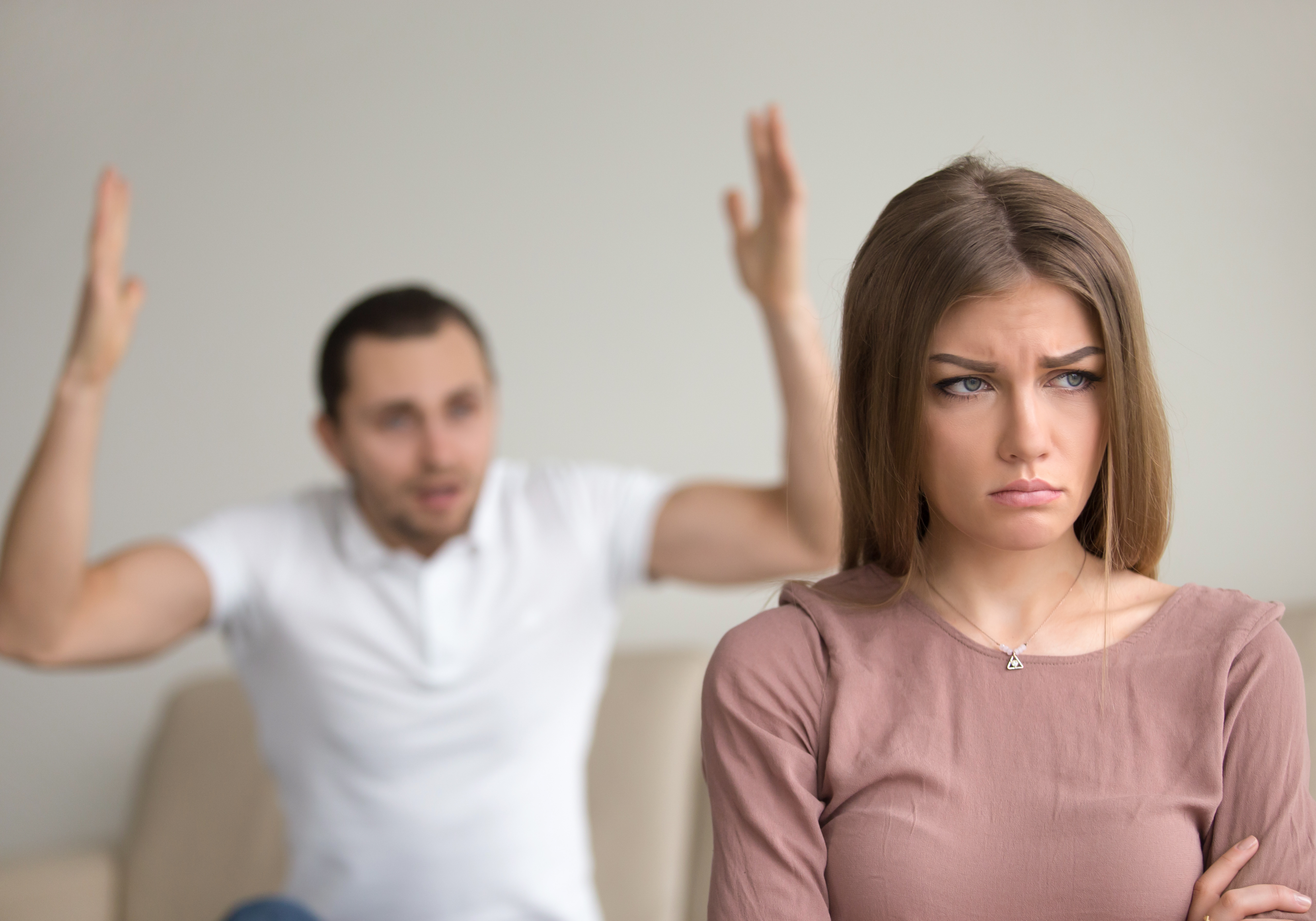 A couple experiencing frustration and distance in their relationship