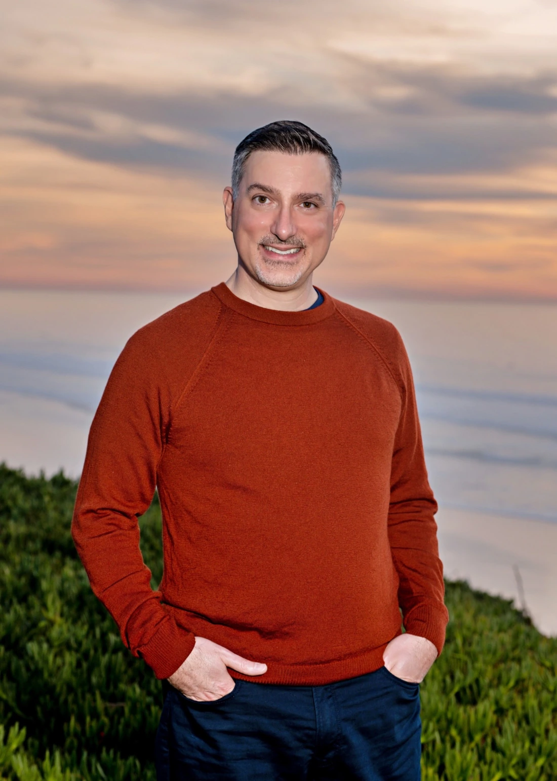Dr. Mark Gregory Karris at sunset by the ocean